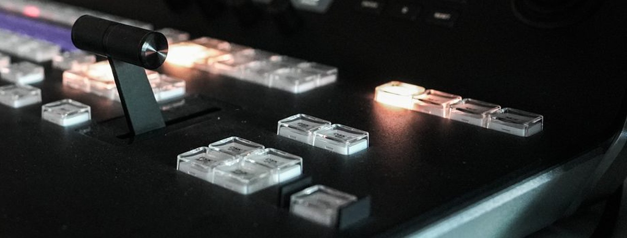 Backlit switcher keys receding into shadow